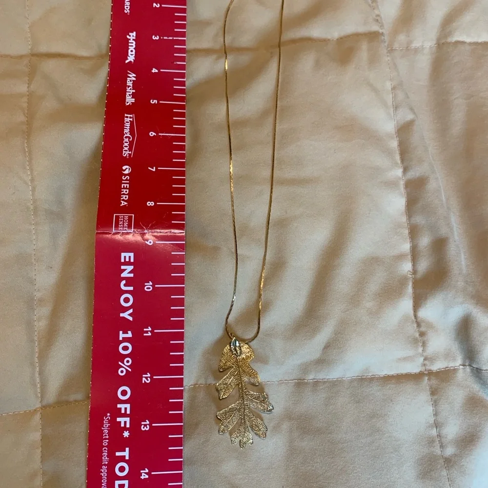 Real leaf dipped in gold pendant